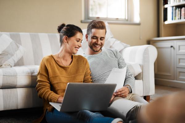 Couple paying bills online