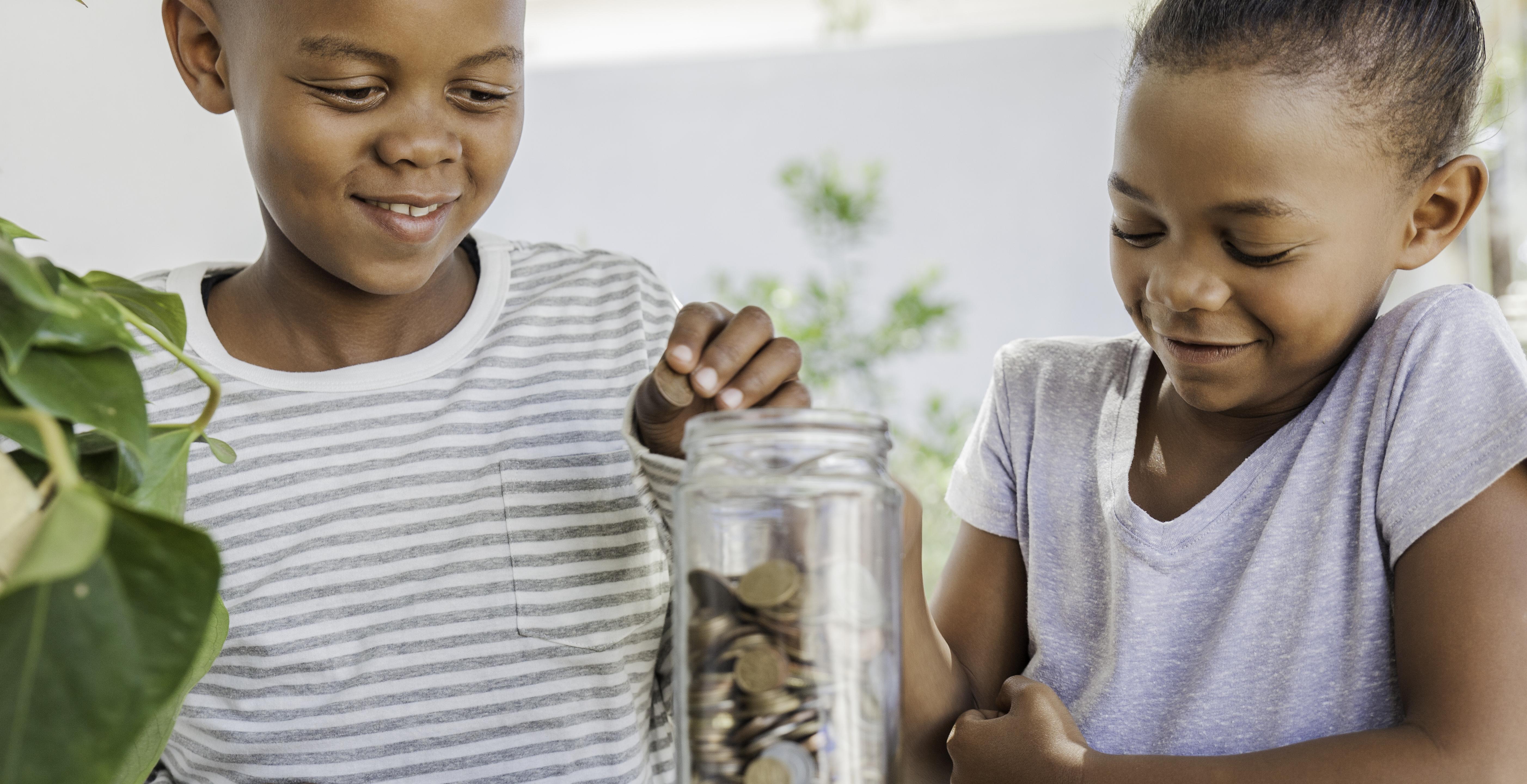 Children Counting Coins in Savings Jar